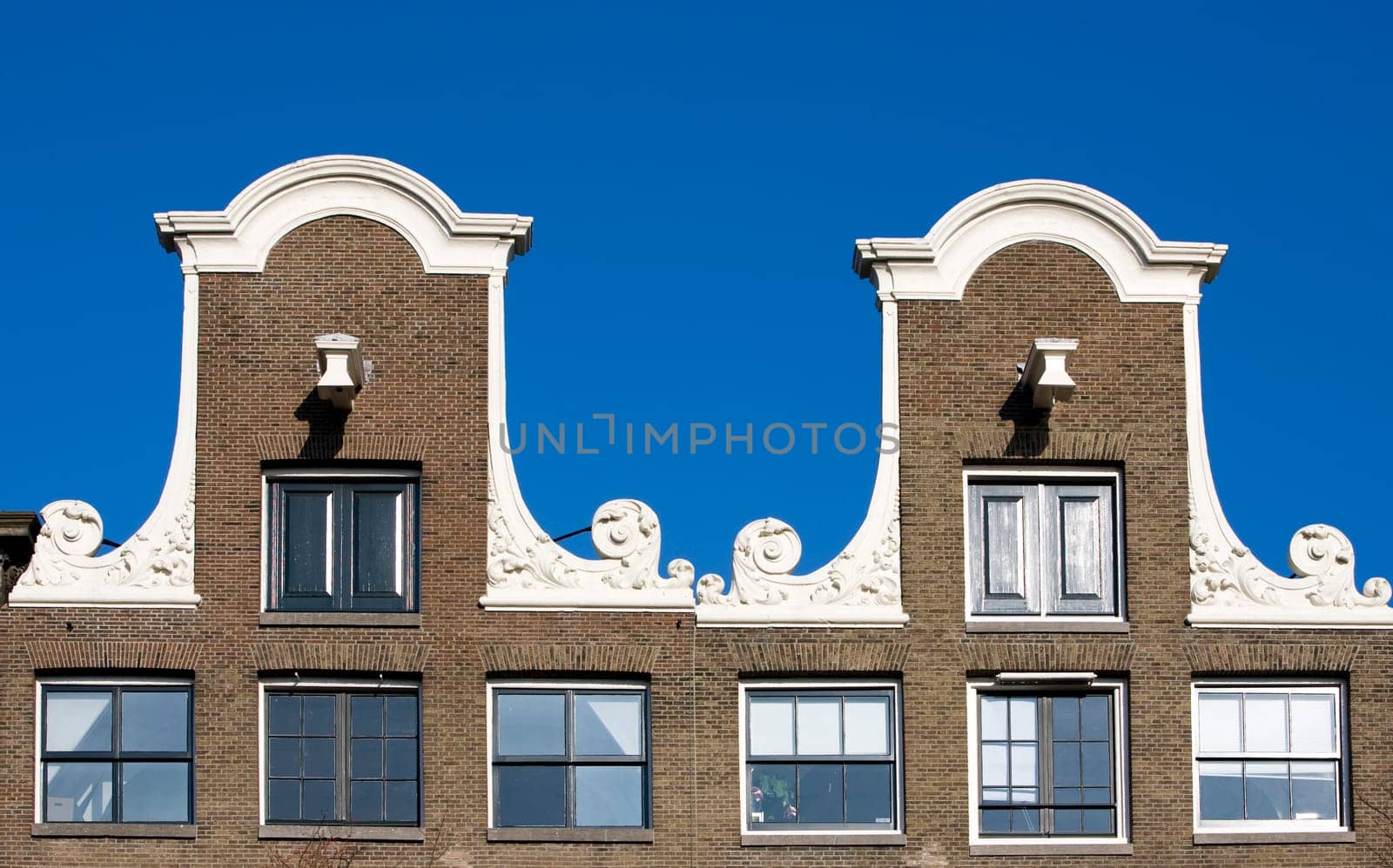 Façade of canal houses in Amsterdam, the Netherlands
