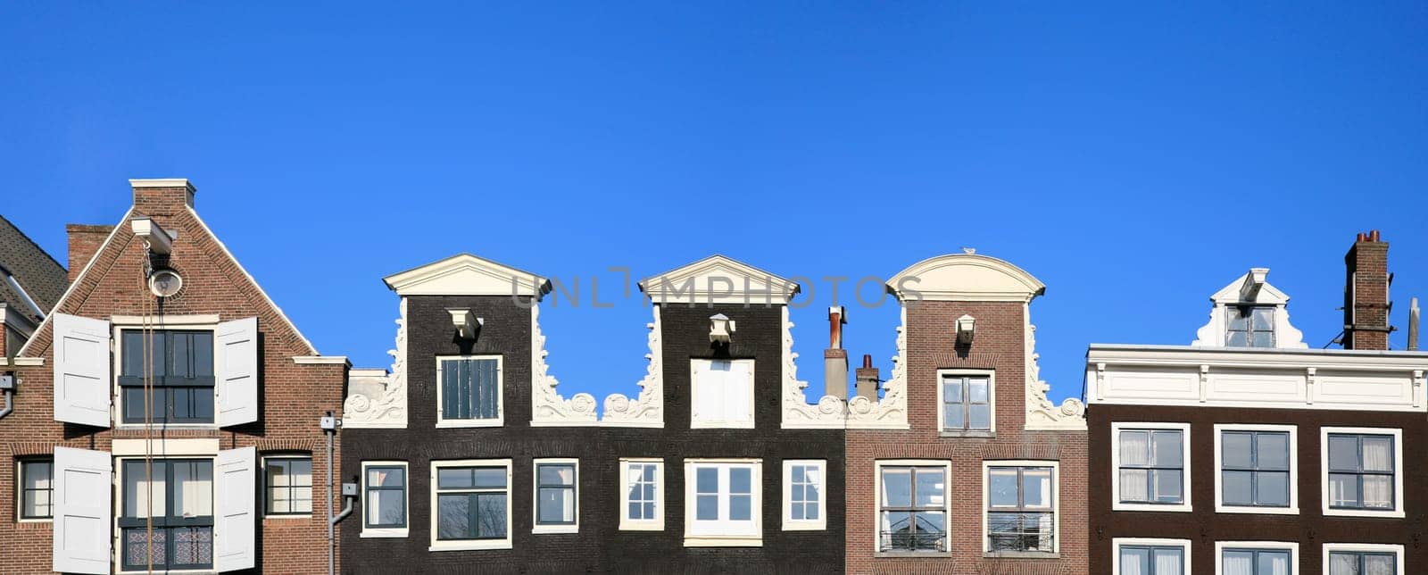 Façade of canal houses in Amsterdam, the Netherlands