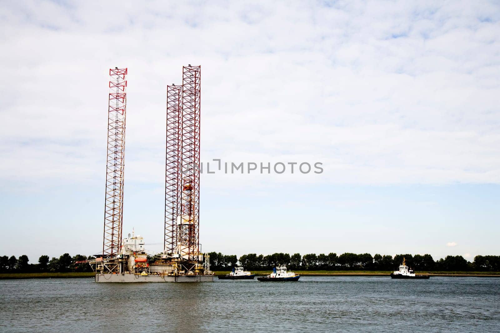 Oil rig is leaving the port of Rotterdam