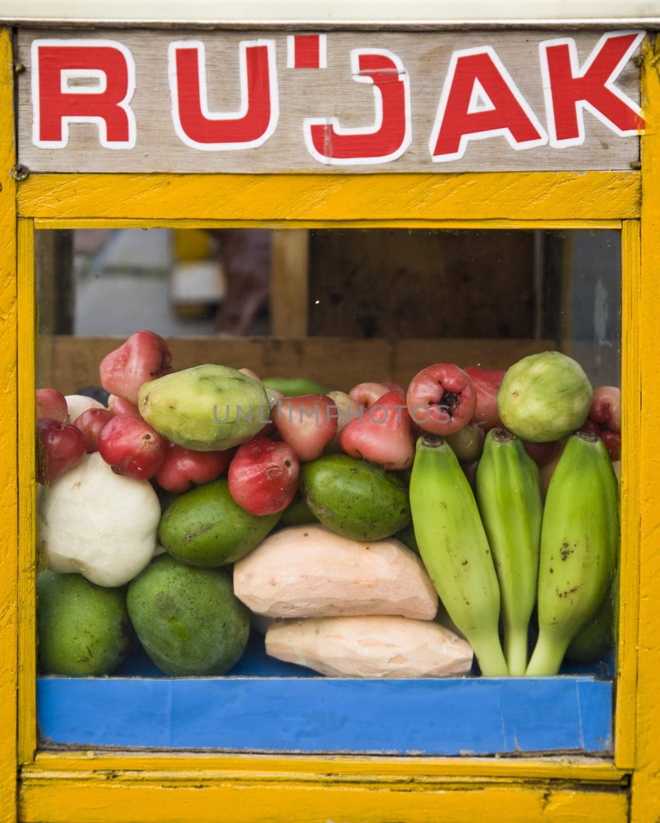 Detail of an Indonesian food stall with fruit rujak.