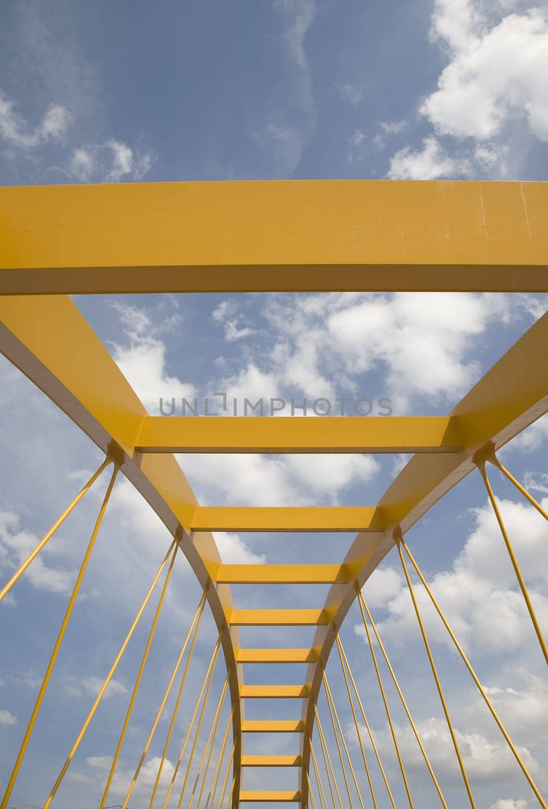 Yellow bridge crossing the Amsterdam-Rijn canal in Utrecht, Holland