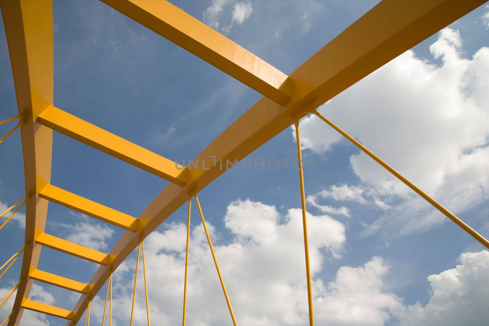 Yellow bridge crossing the Amsterdam-Rijn canal in Utrecht, Holland