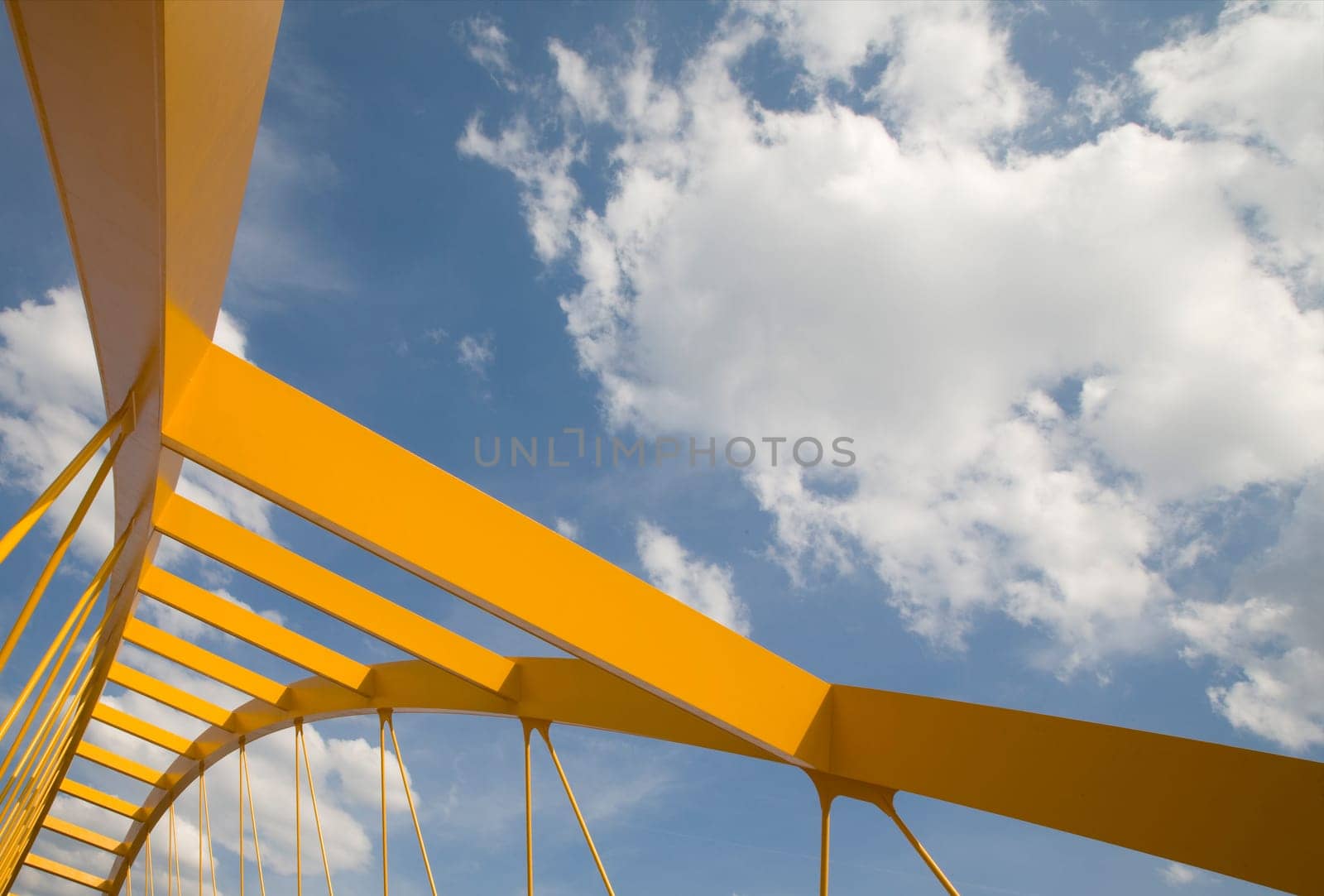 Yellow bridge crossing the Amsterdam-Rijn canal in Utrecht, Holland