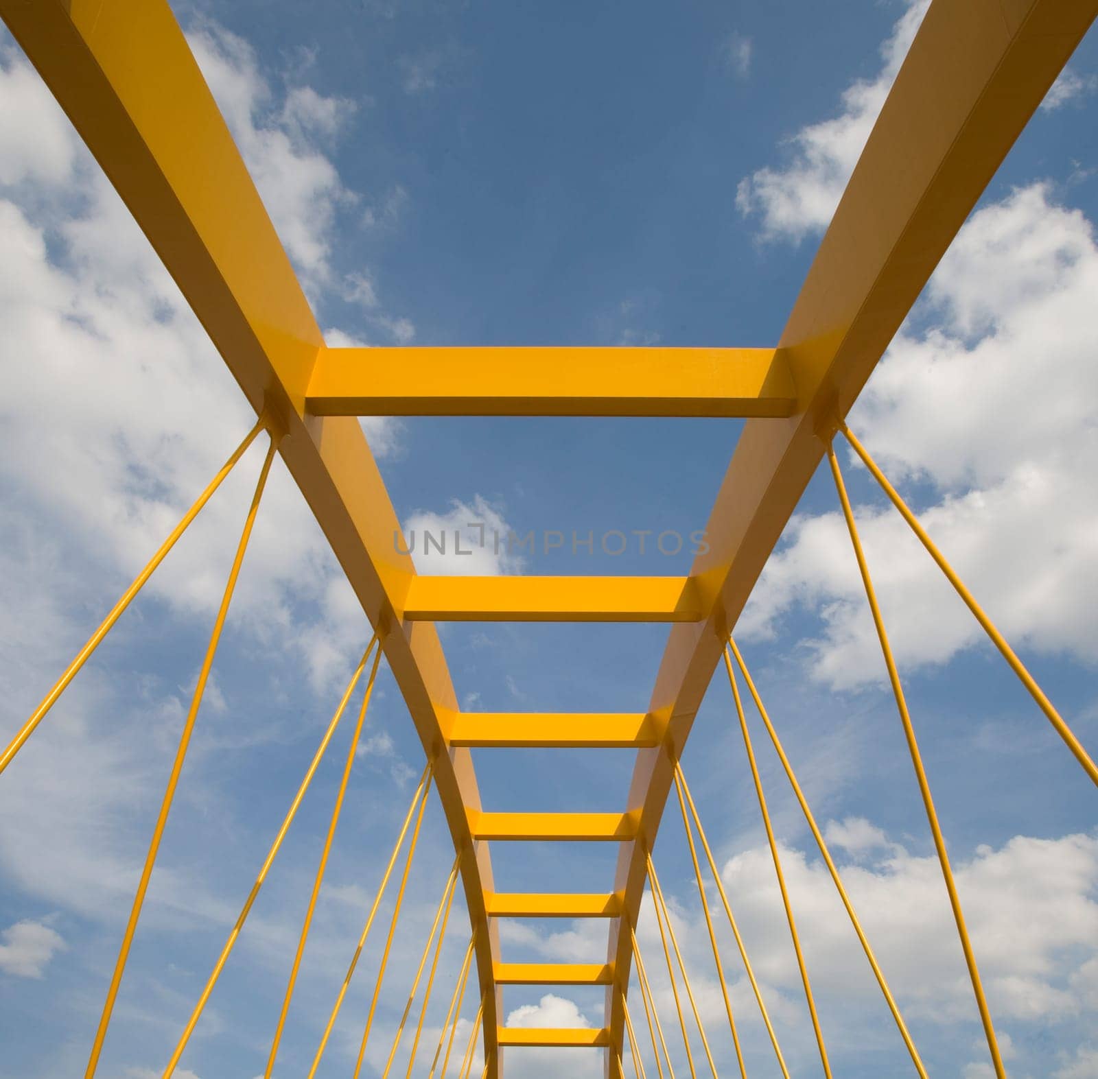 Yellow bridge crossing the Amsterdam-Rijn canal in Utrecht, Holland