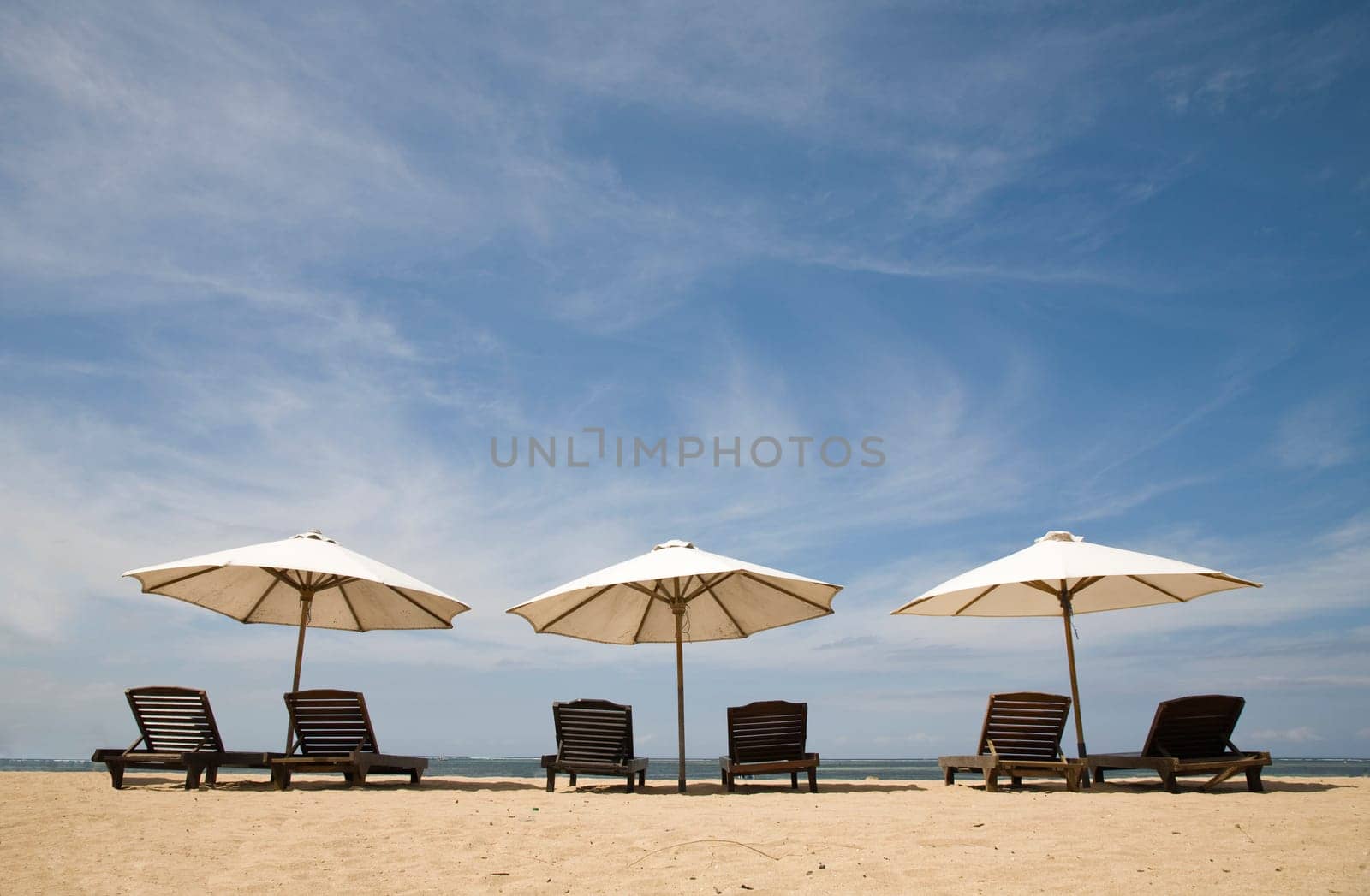 Beach chairs at Sanur beach, Bali