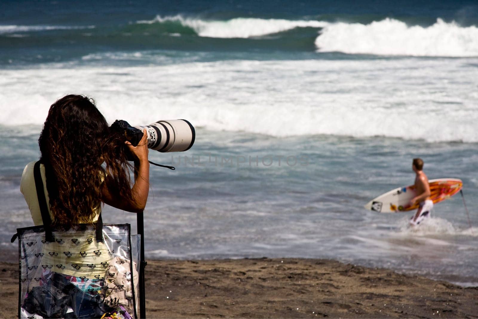 Surf photographer at Chenggu beach in Bali