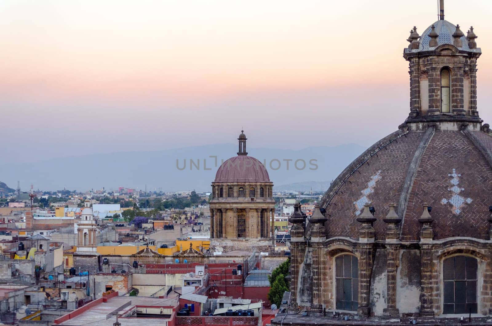Church domes and cityscape in Mexico City