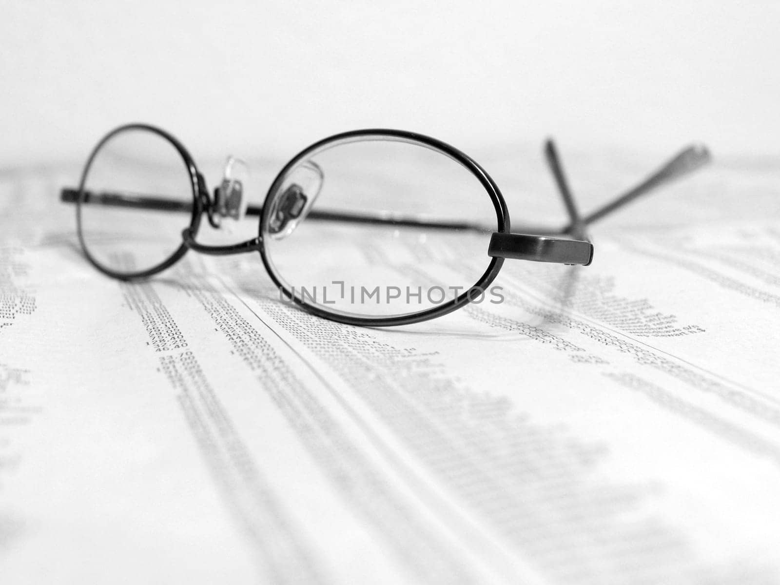 Glasses and newspaper