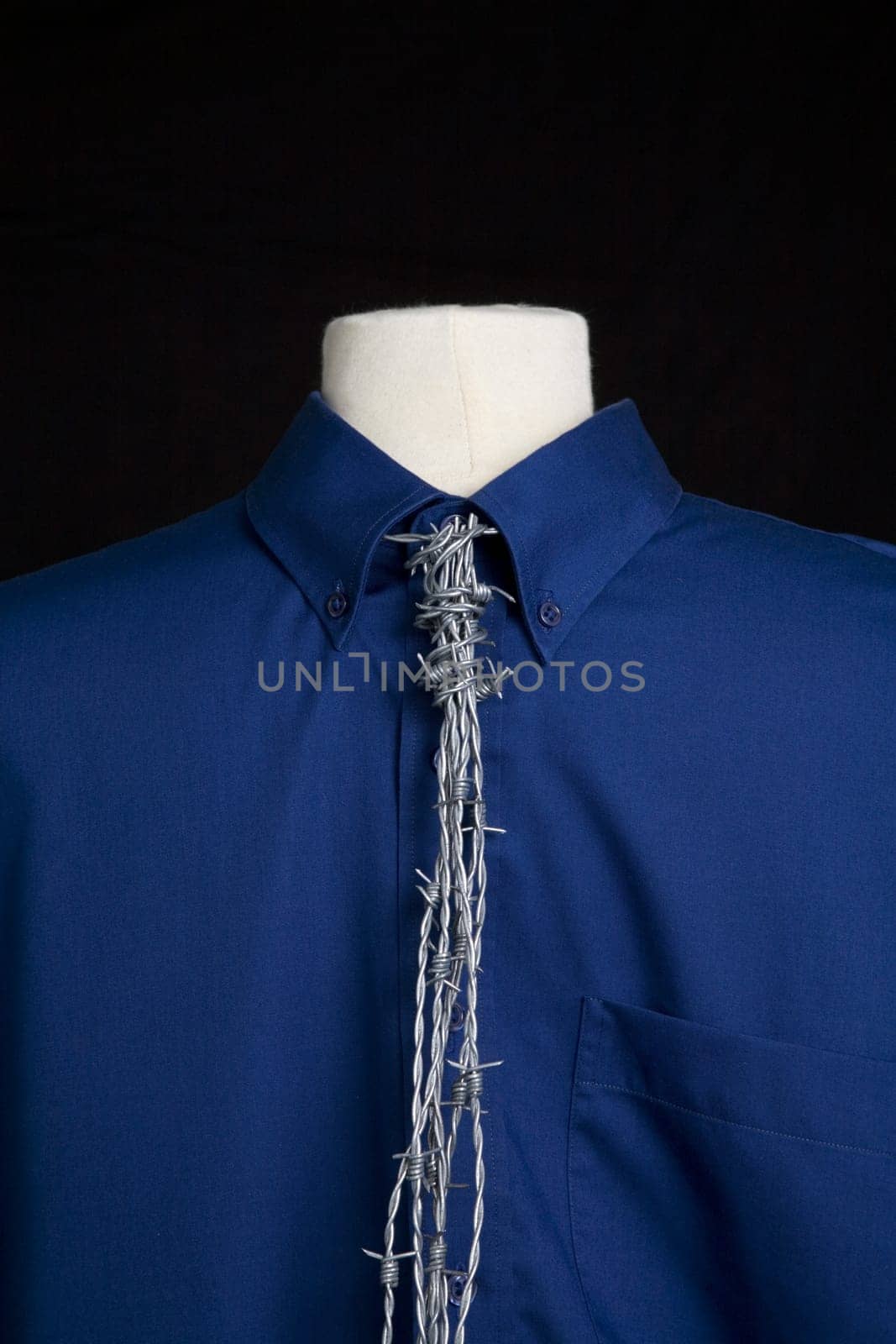 Blue shirt with barbed wire tie