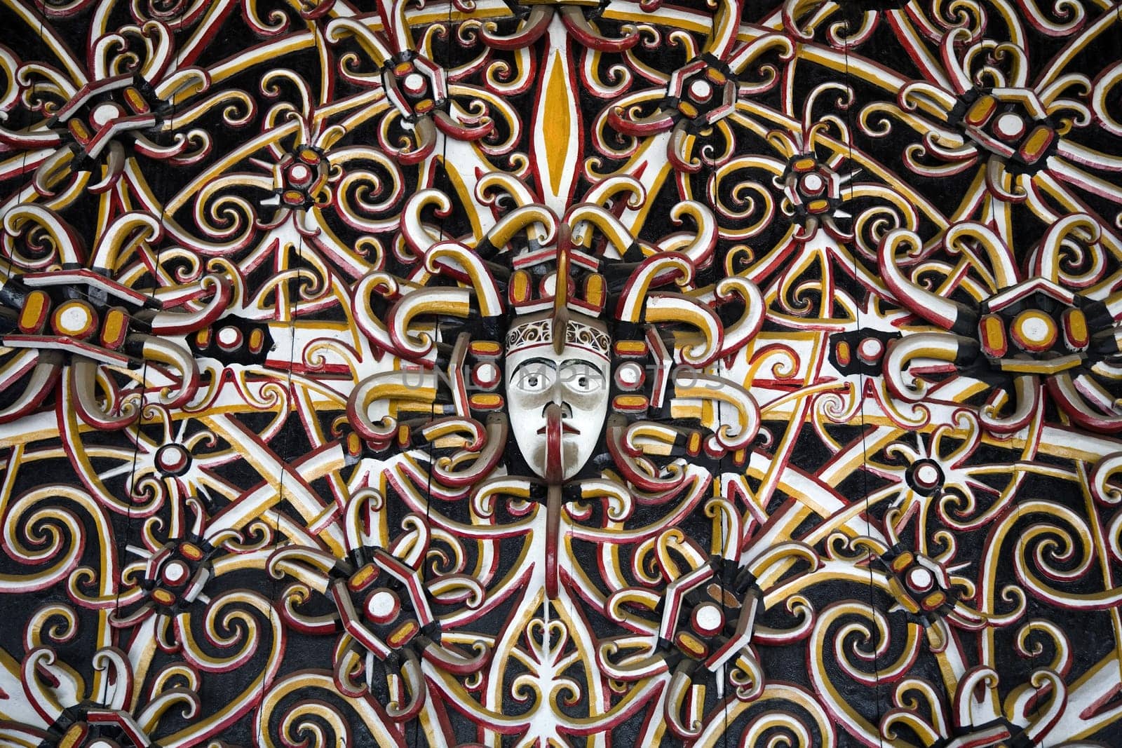 Traditional colorful and woodcarved Indonesian wall