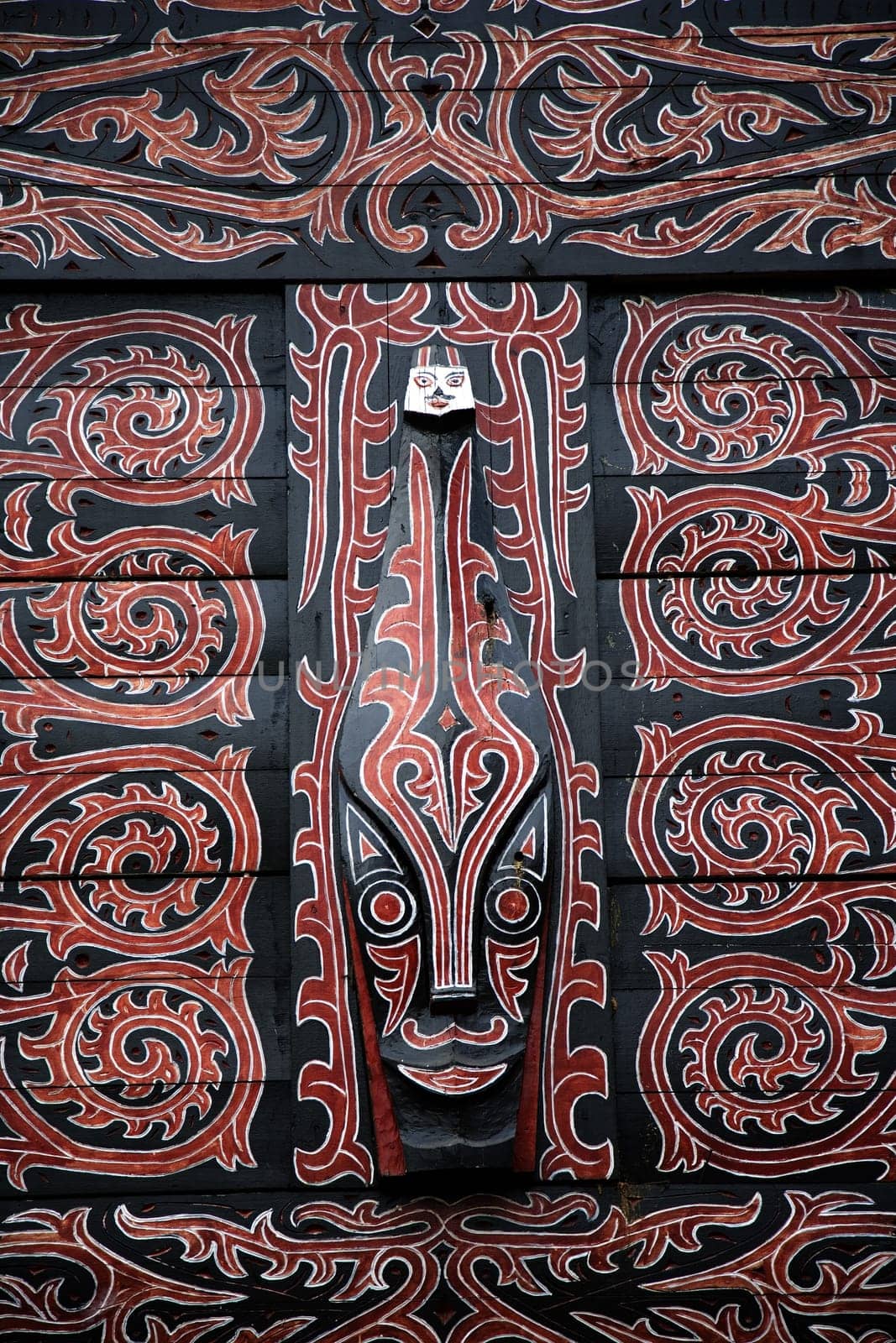 Traditional colorful and woodcarved Indonesian wall