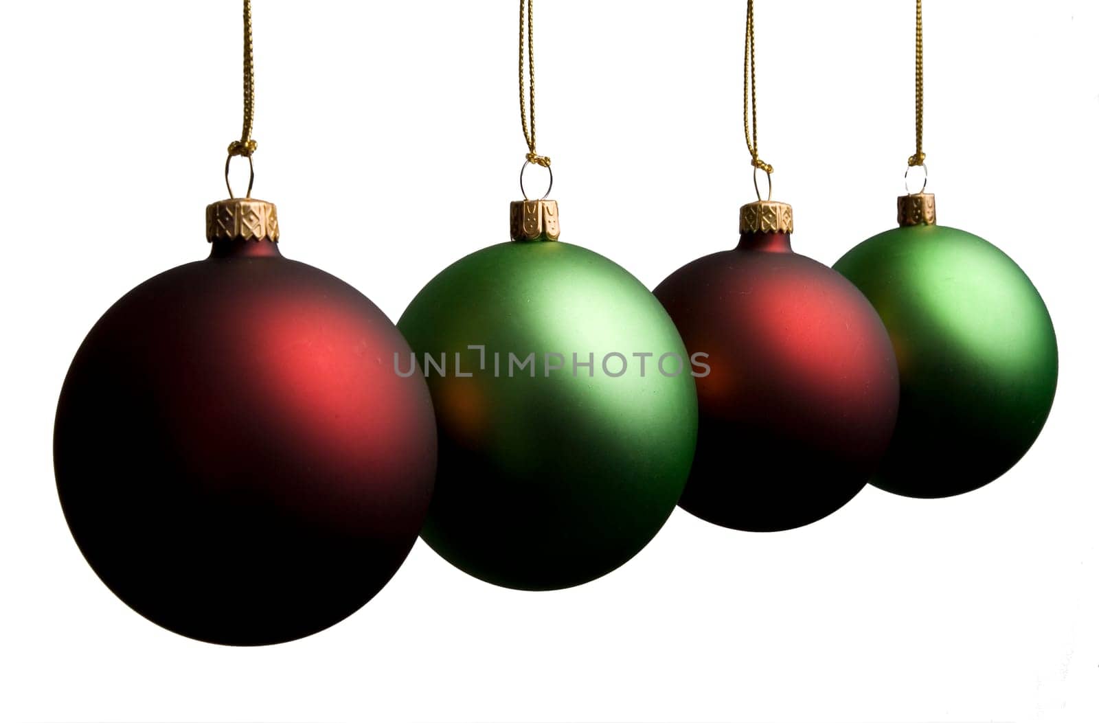 Green and red Christmas balls on a white background