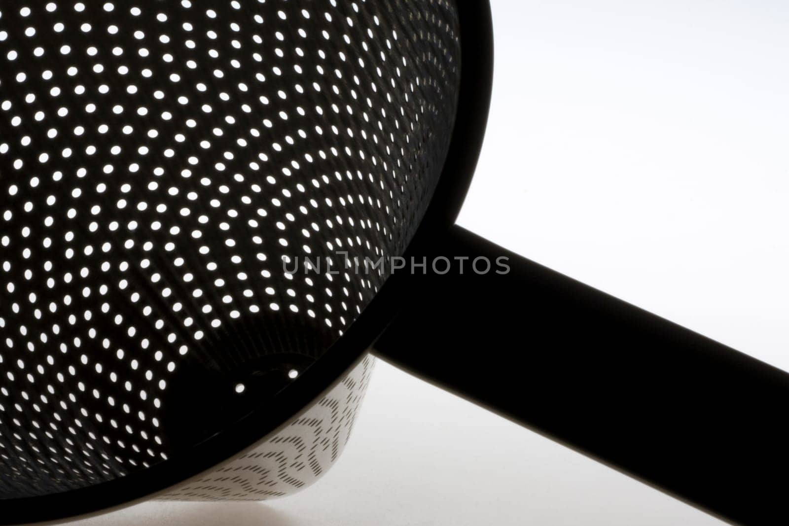 Colander on a white background