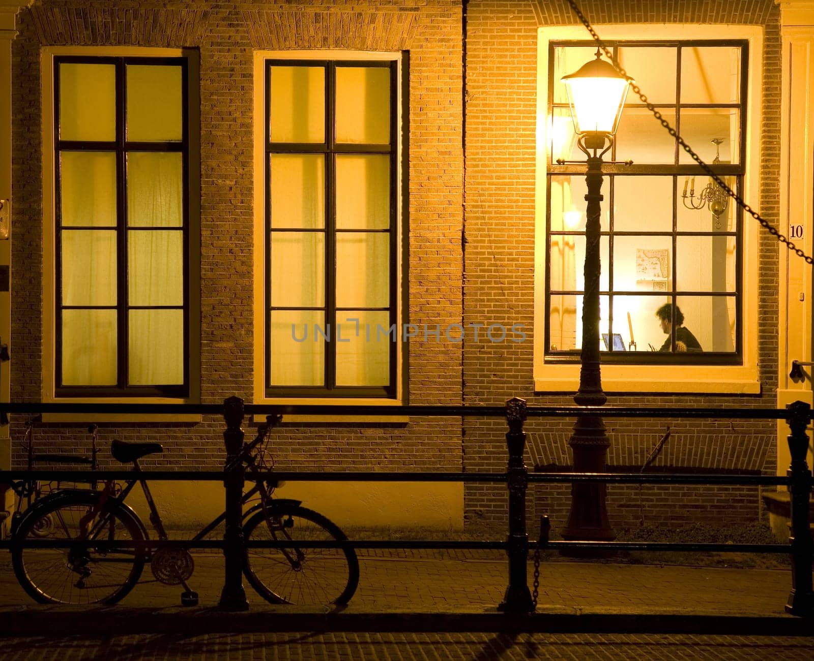 Working at night in an Amsterdam canal house