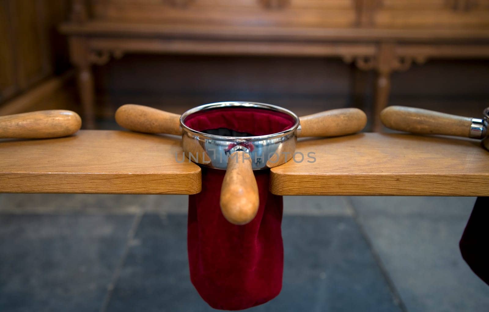 Collector pockets in a Dutch church