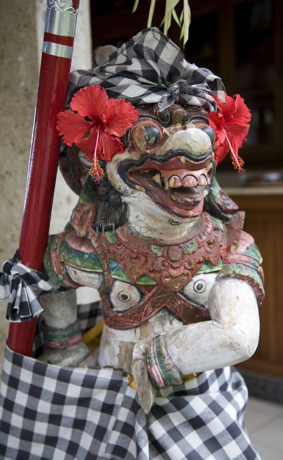 Balinese statue guarding an entrance