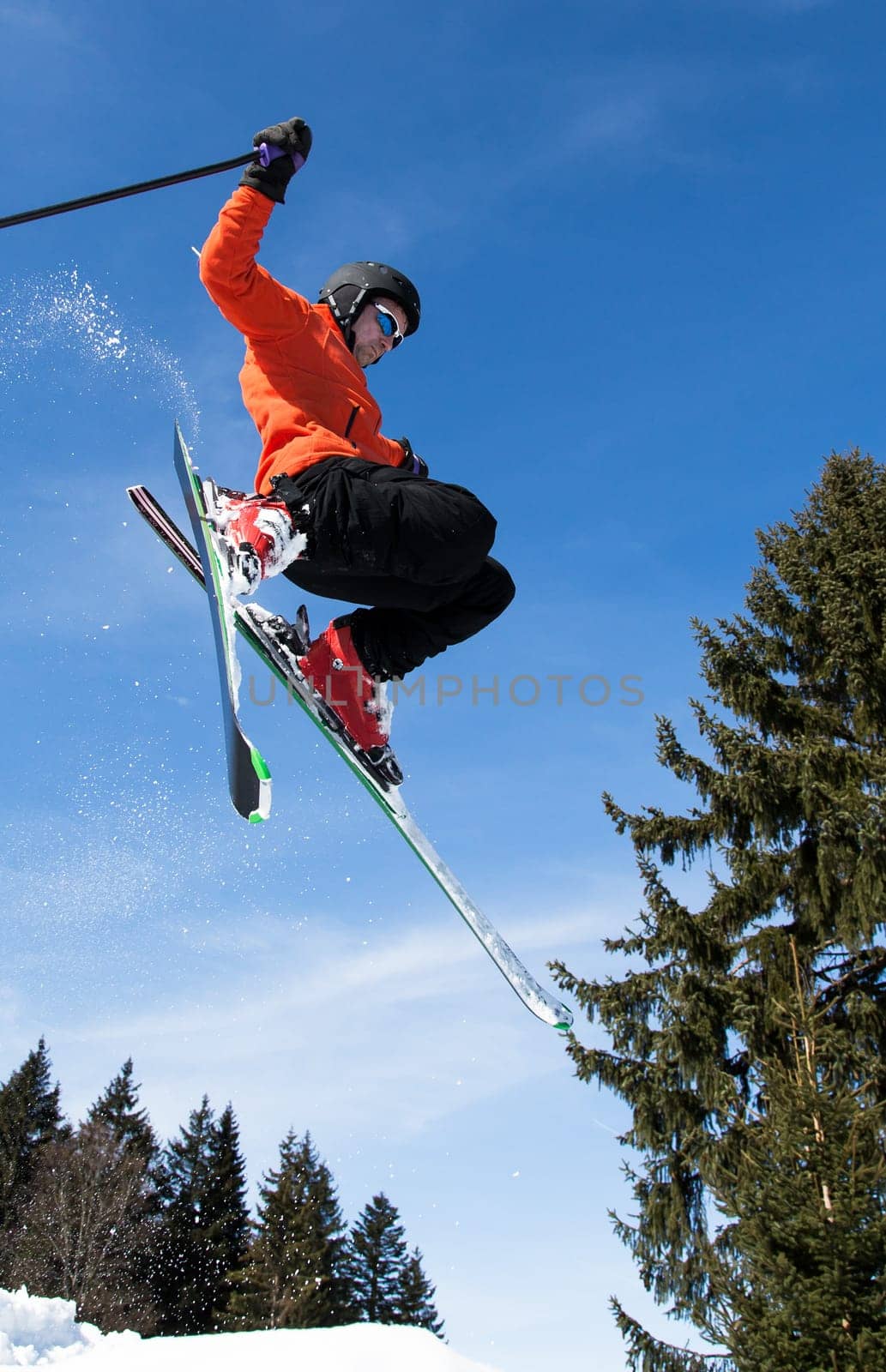 Skiers in the jump