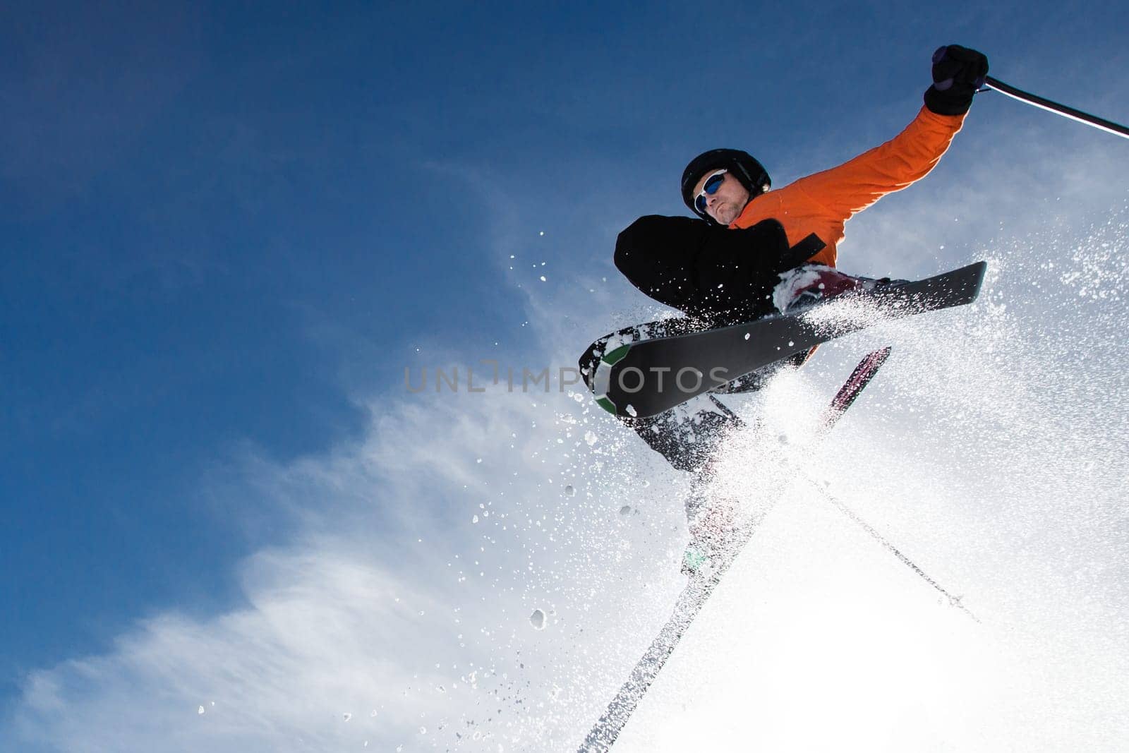 Skiers in the jump