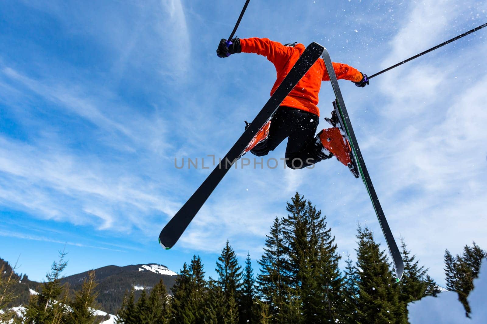 Skiers in the jump