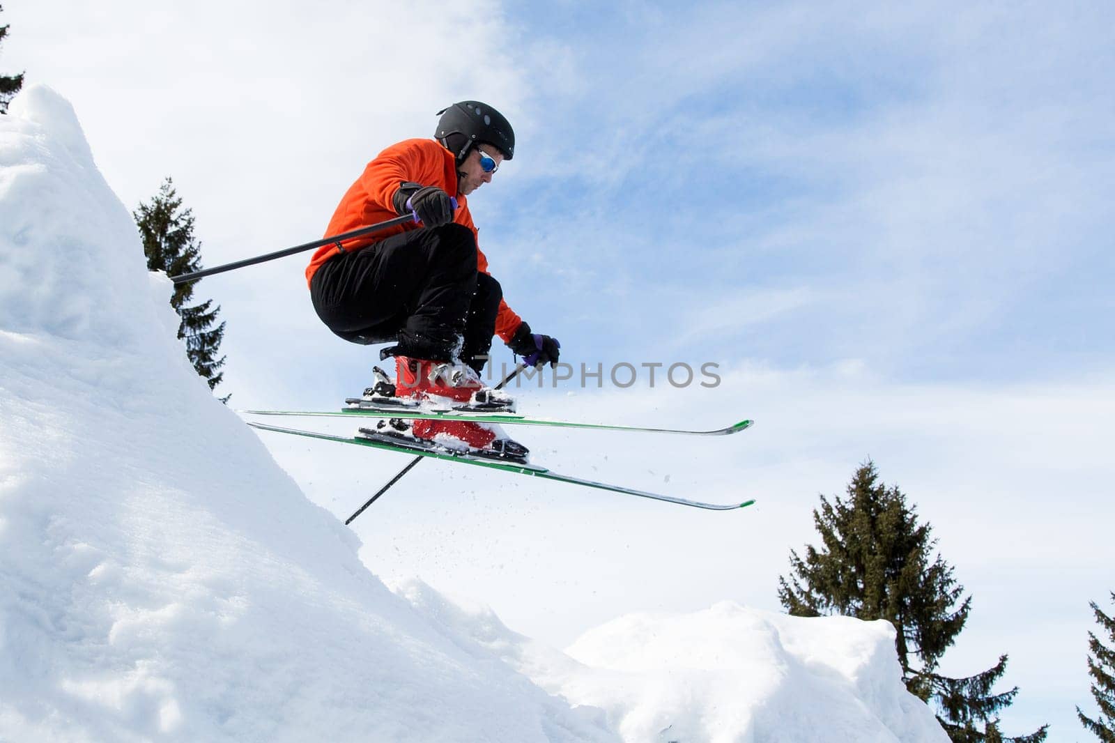 Skiers in the jump