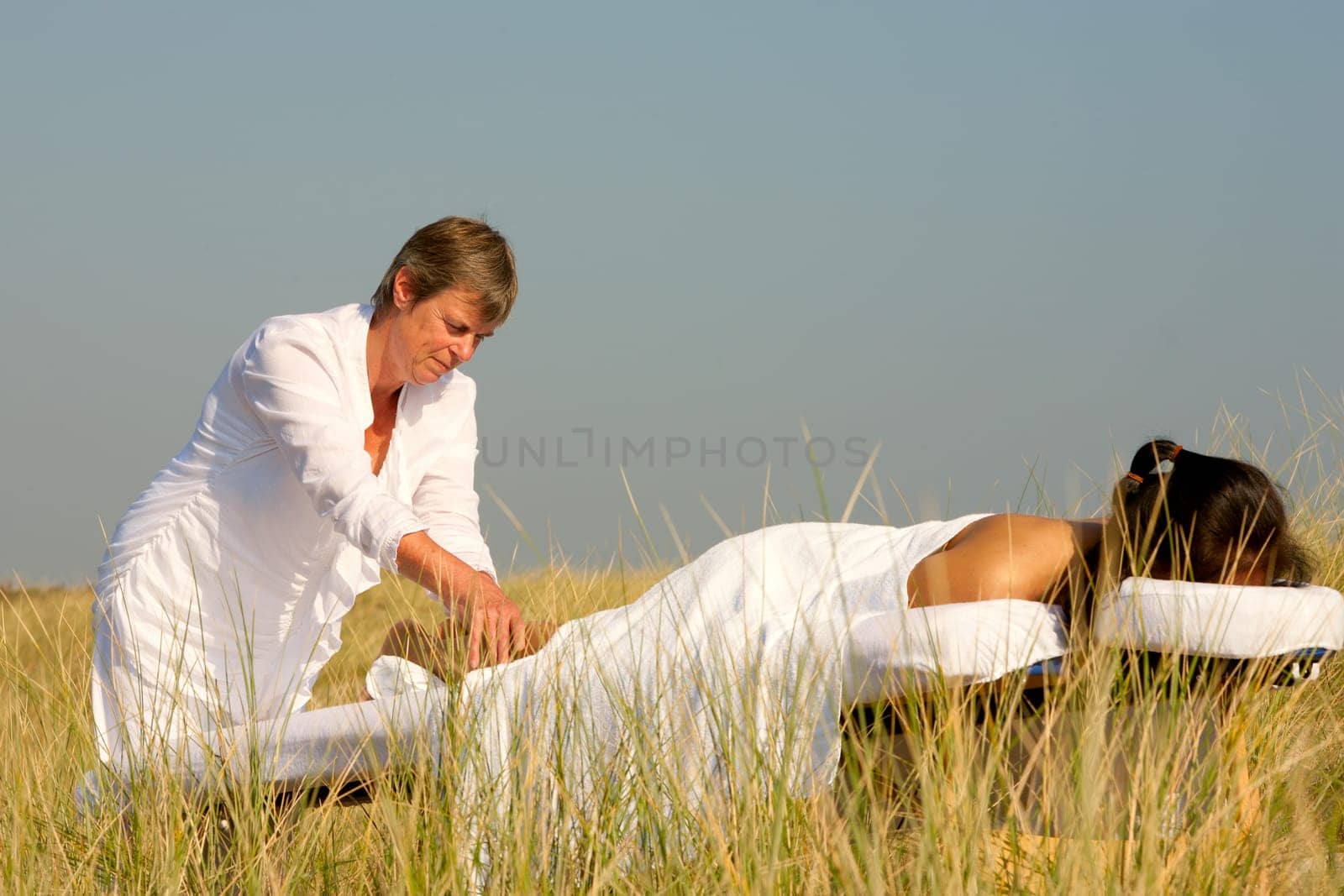 Massage in the dunes on the island Ameland, the Netherlands