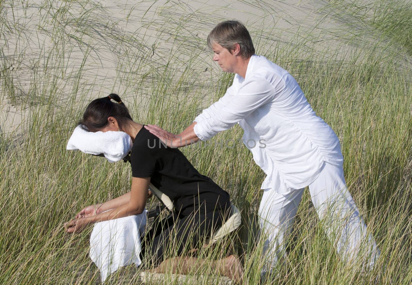 Chair massage in the dunes on the island Ameland, the Netherlands