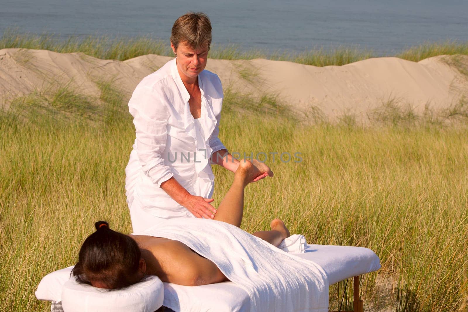 Massage in the dunes on the island Ameland, the Netherlands