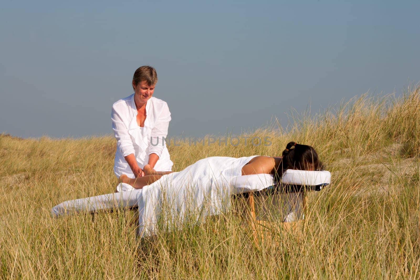Massage in the dunes on the island Ameland, the Netherlands