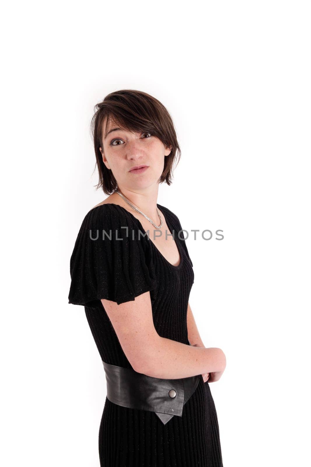 variation of expression on the face of a young brunette woman in studio with a colored scarf