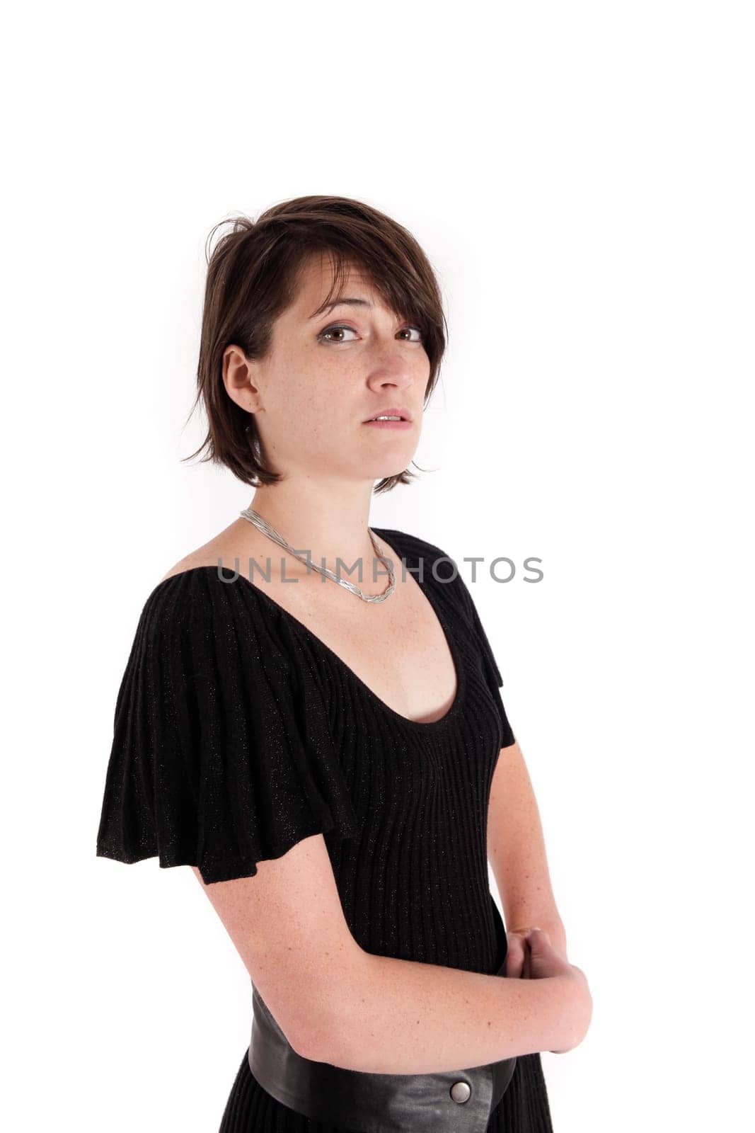 variation of expression on the face of a young brunette woman in studio with a colored scarf