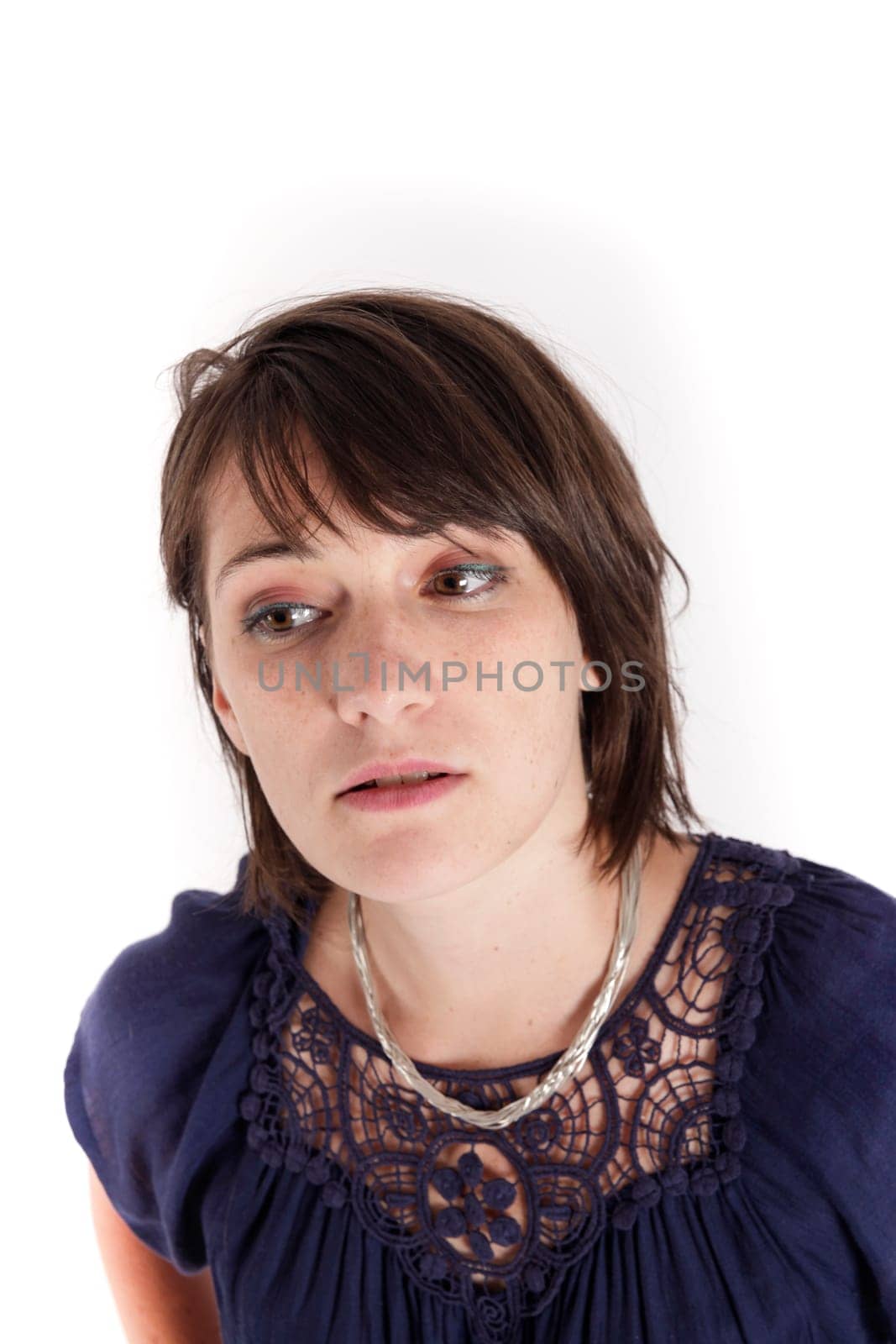 variation face of a young brunette woman on studio