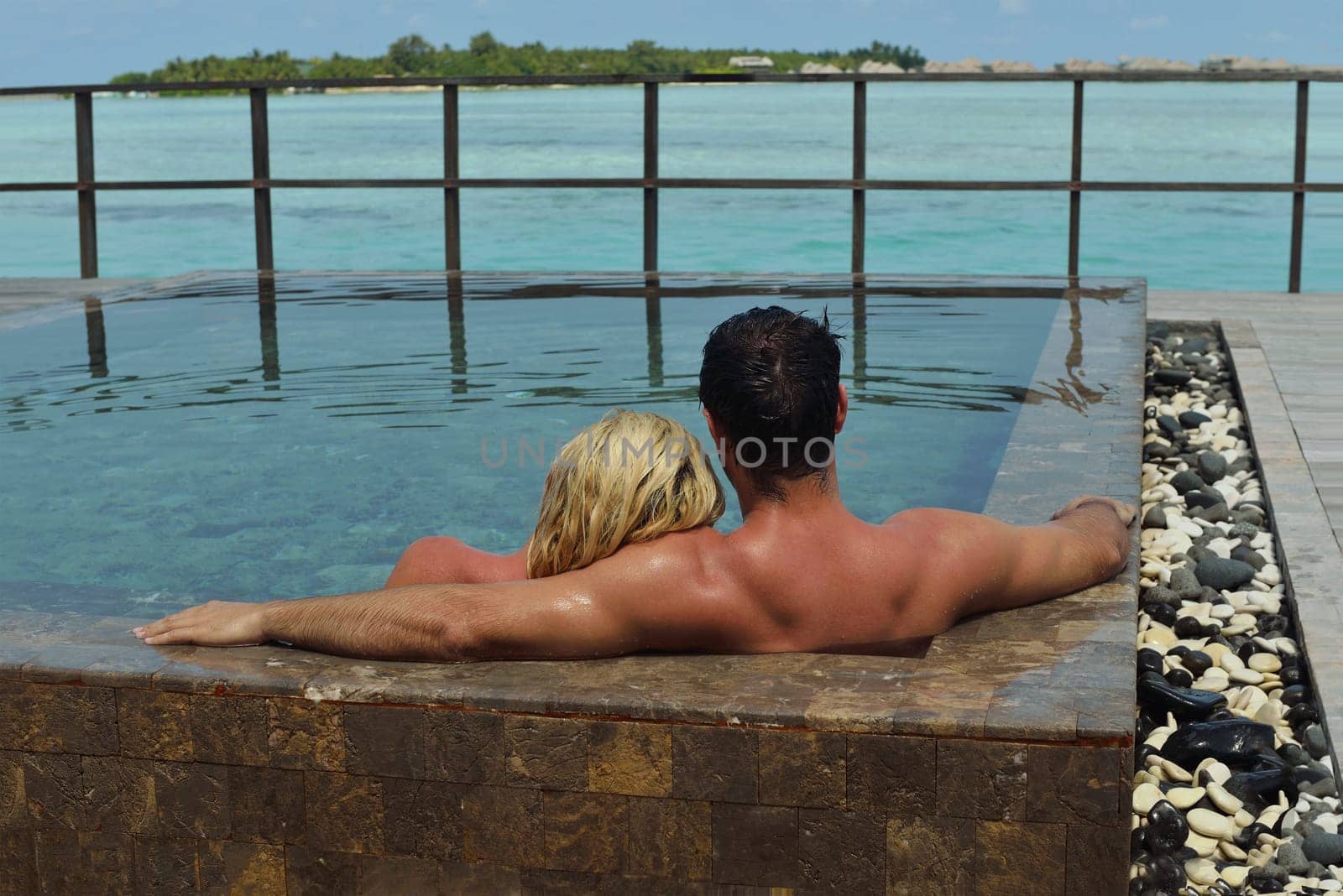 happy young  couple at summer vacation have fun and relax at beautiful sunny  day on beach