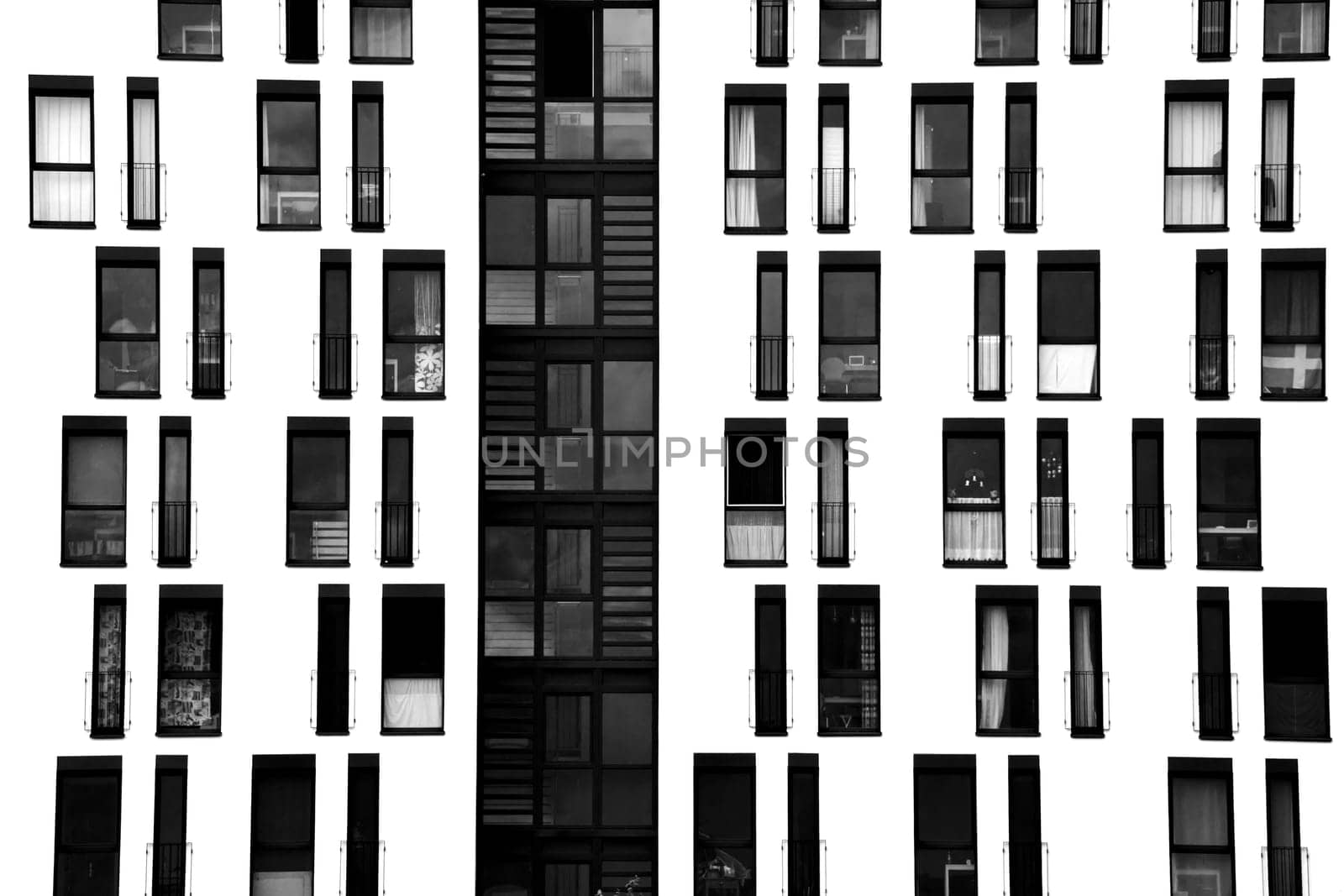 The photograph of a façade with symmetrically arranged windows.