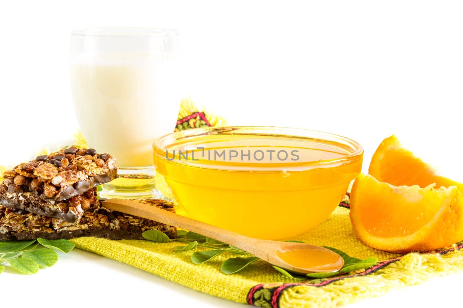 Healthy breakfast with honey, milk and cereals bars
