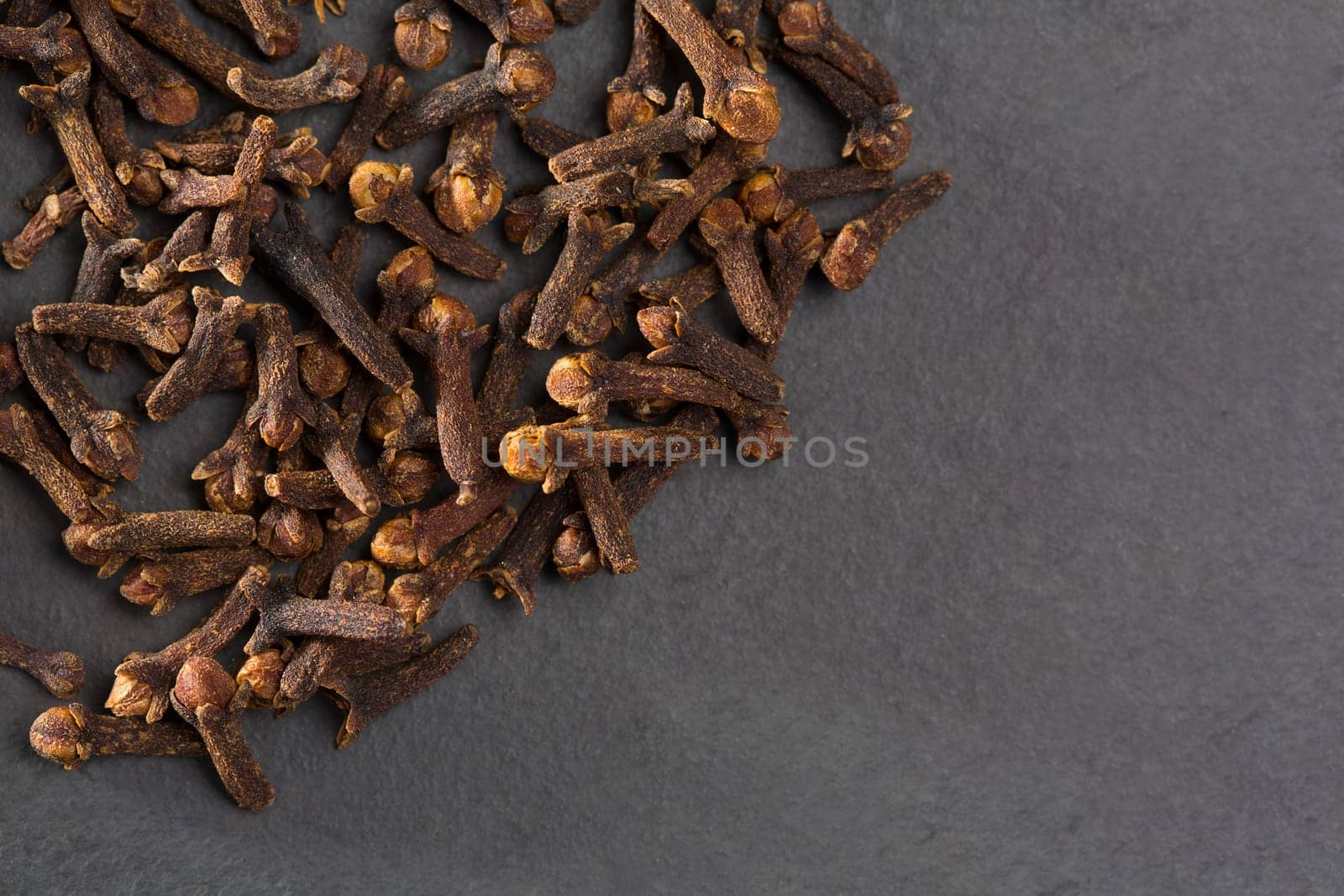 Cloves spice macro closeup on black background