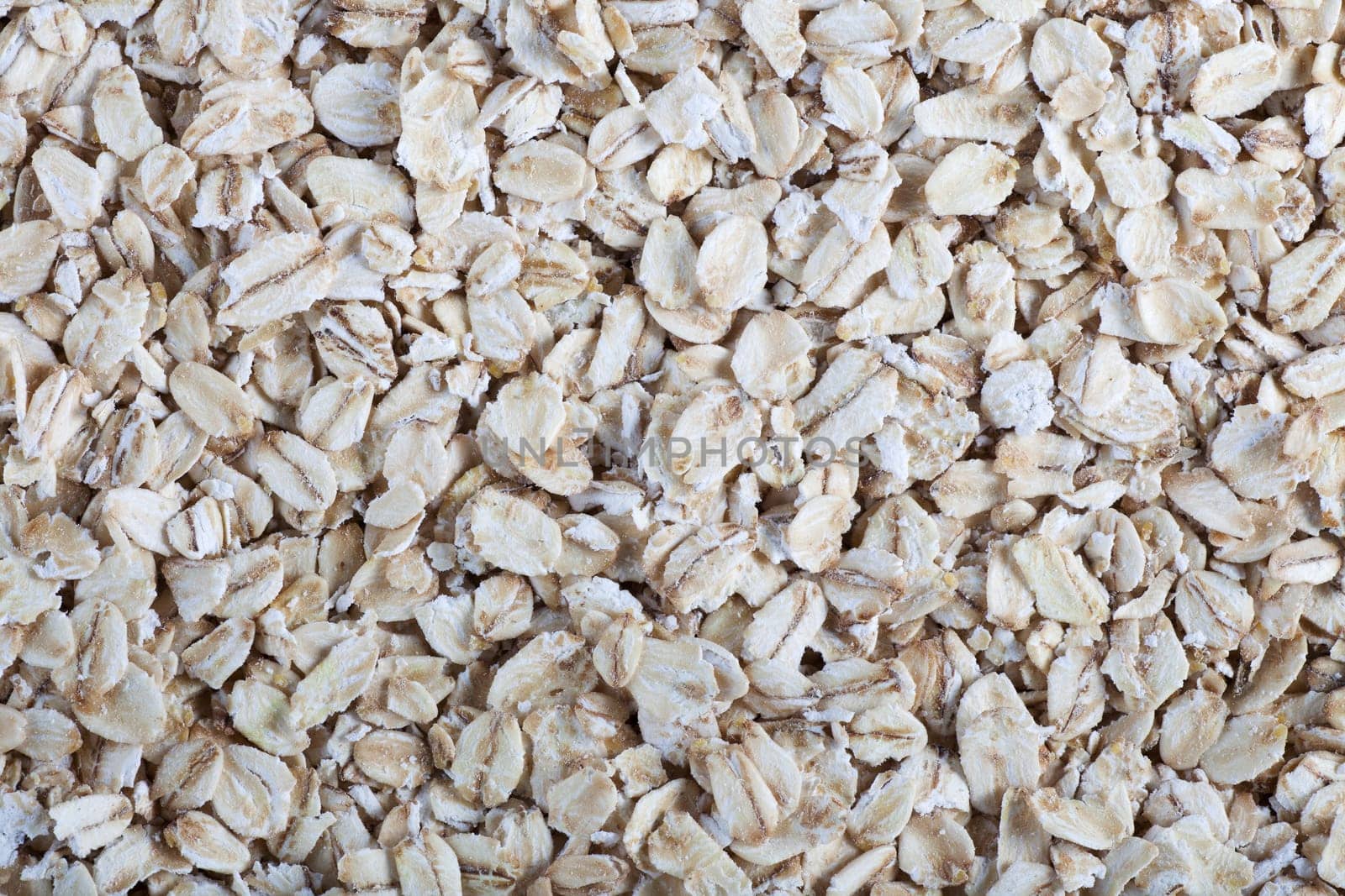 Rolled oats food background or texture