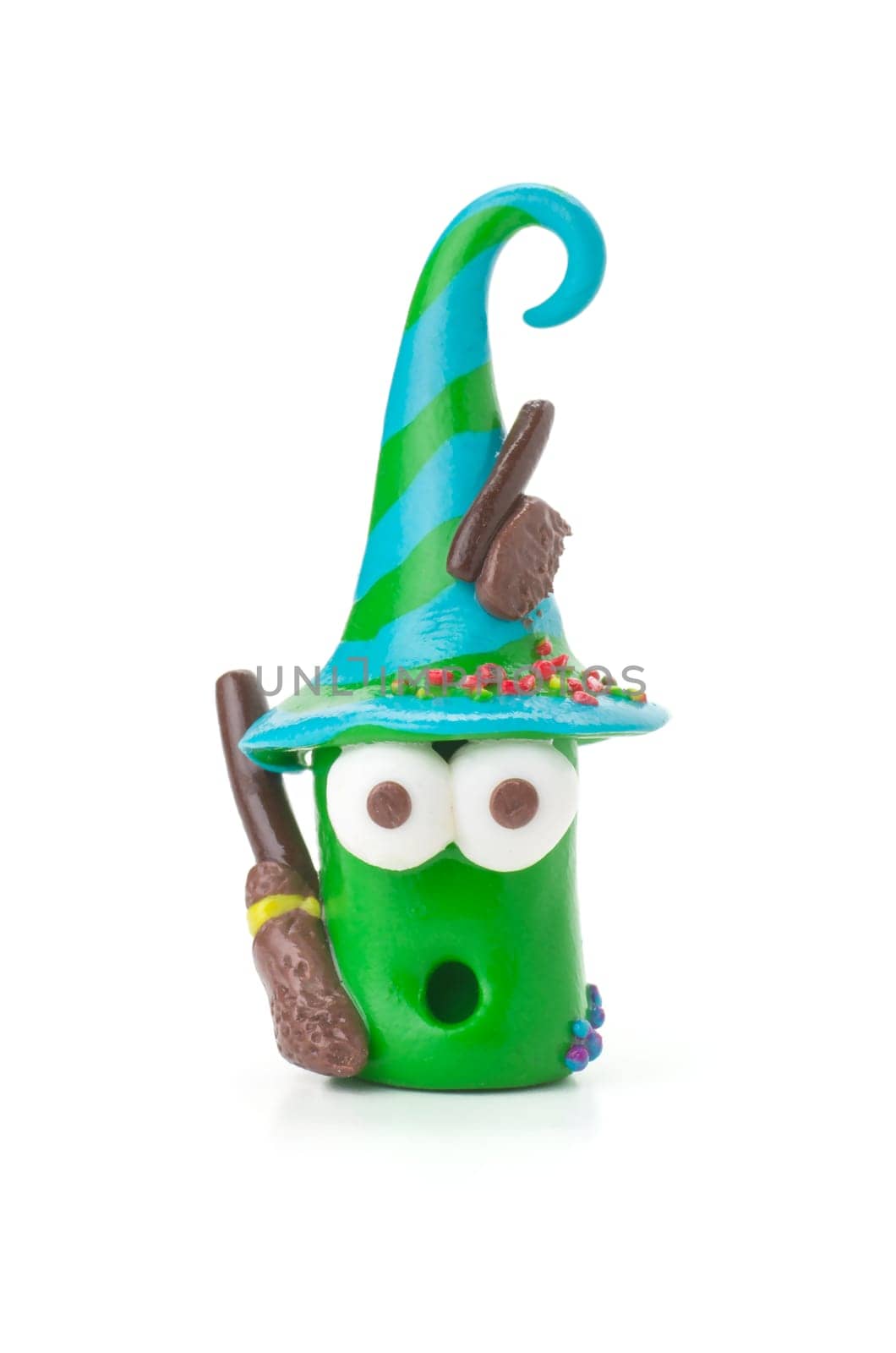 Handmade clay figure with broom