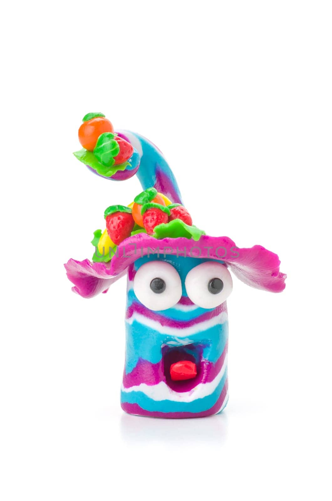 Handmade clay figure with fruits
