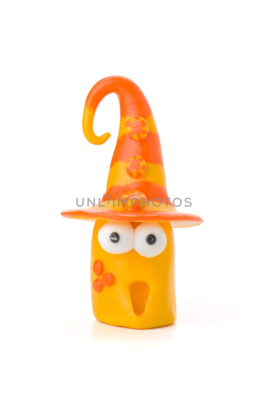 Handmade clay figure with buttons on the hat