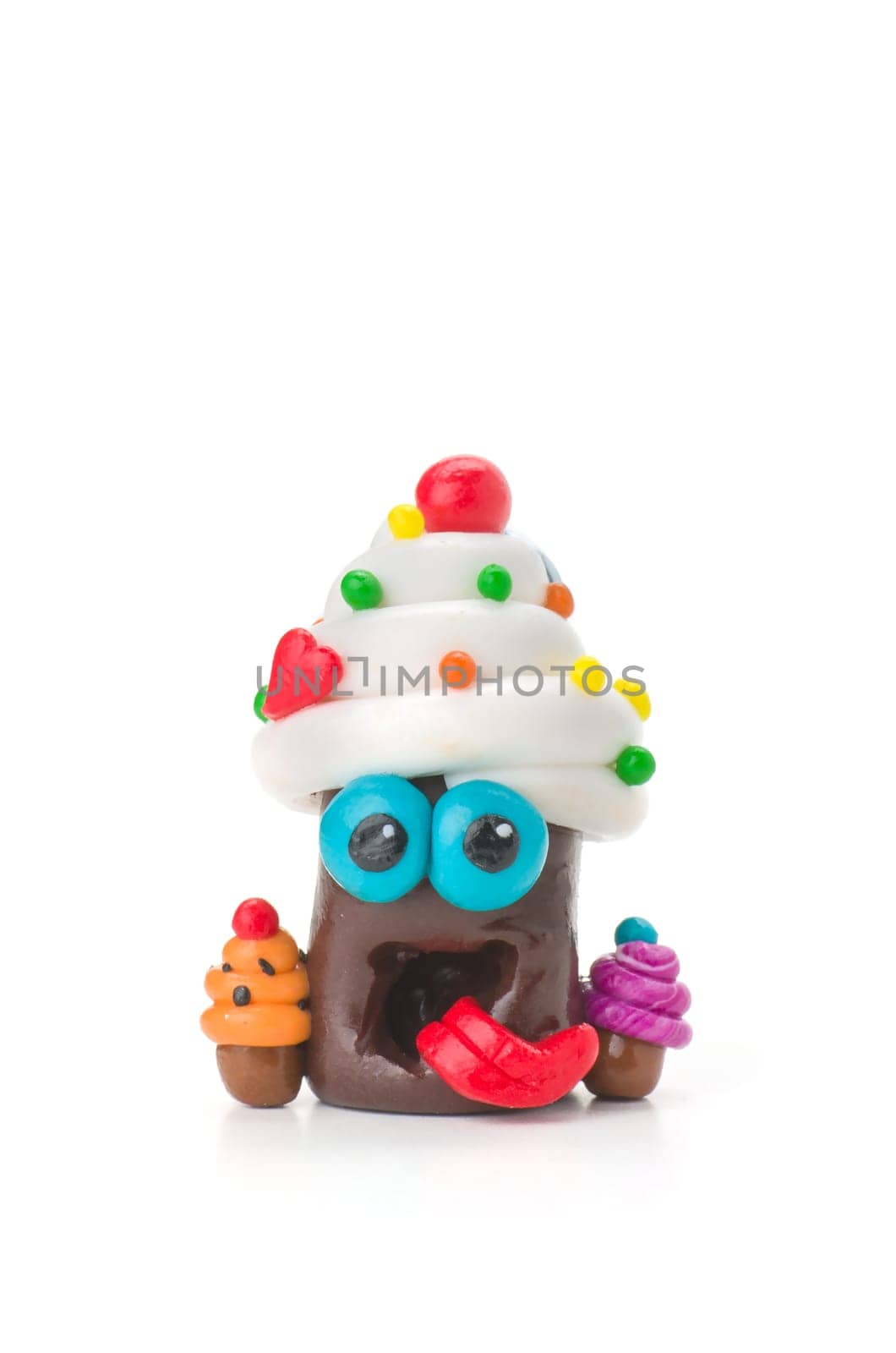 Handmade clay figure with sweets
