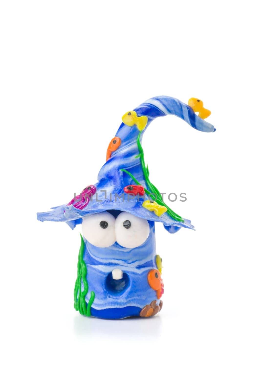 Handmade clay figure with fish