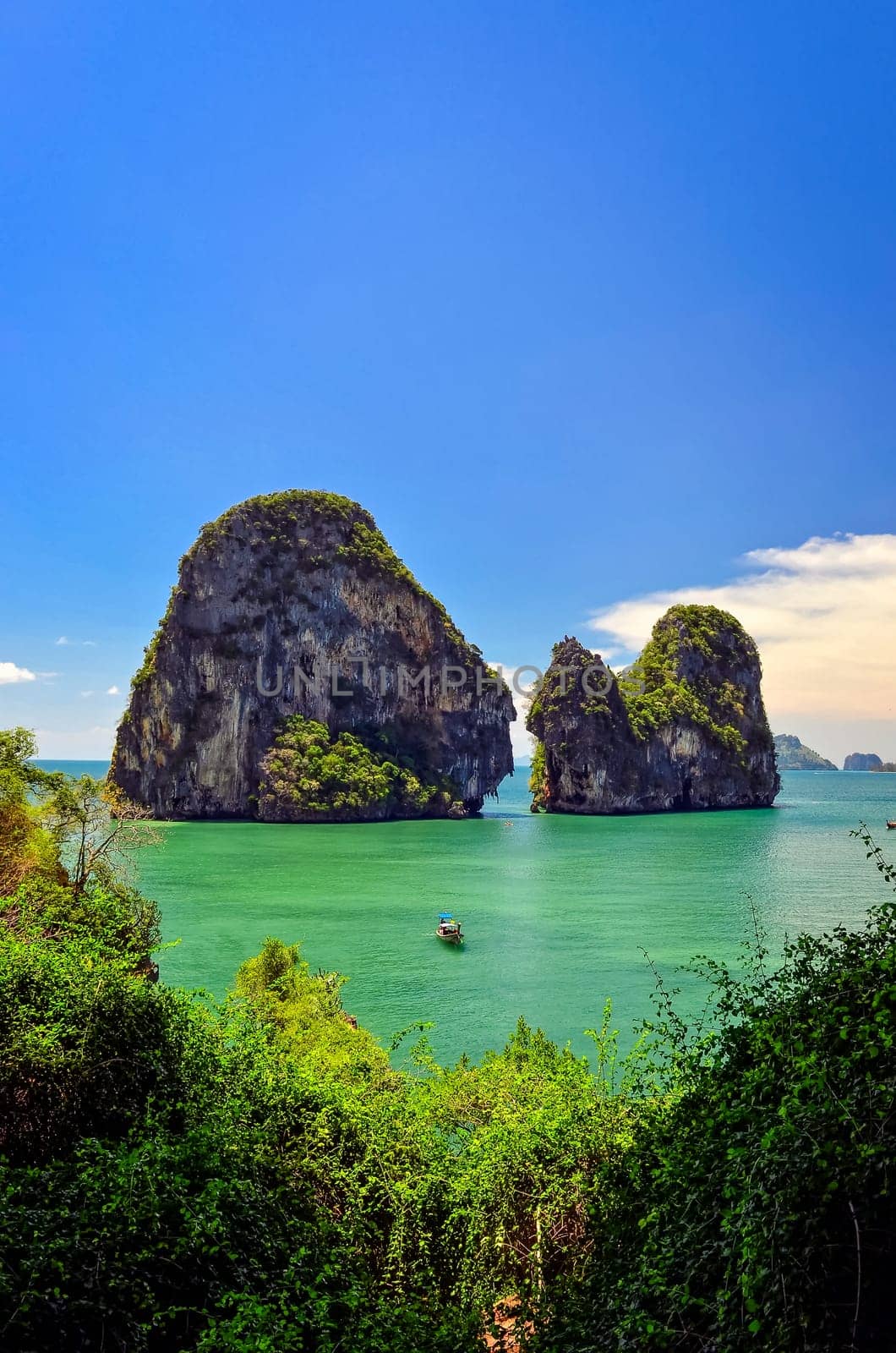 Tropical island and sea view with boat, Andaman sea, Krabi, Thailand