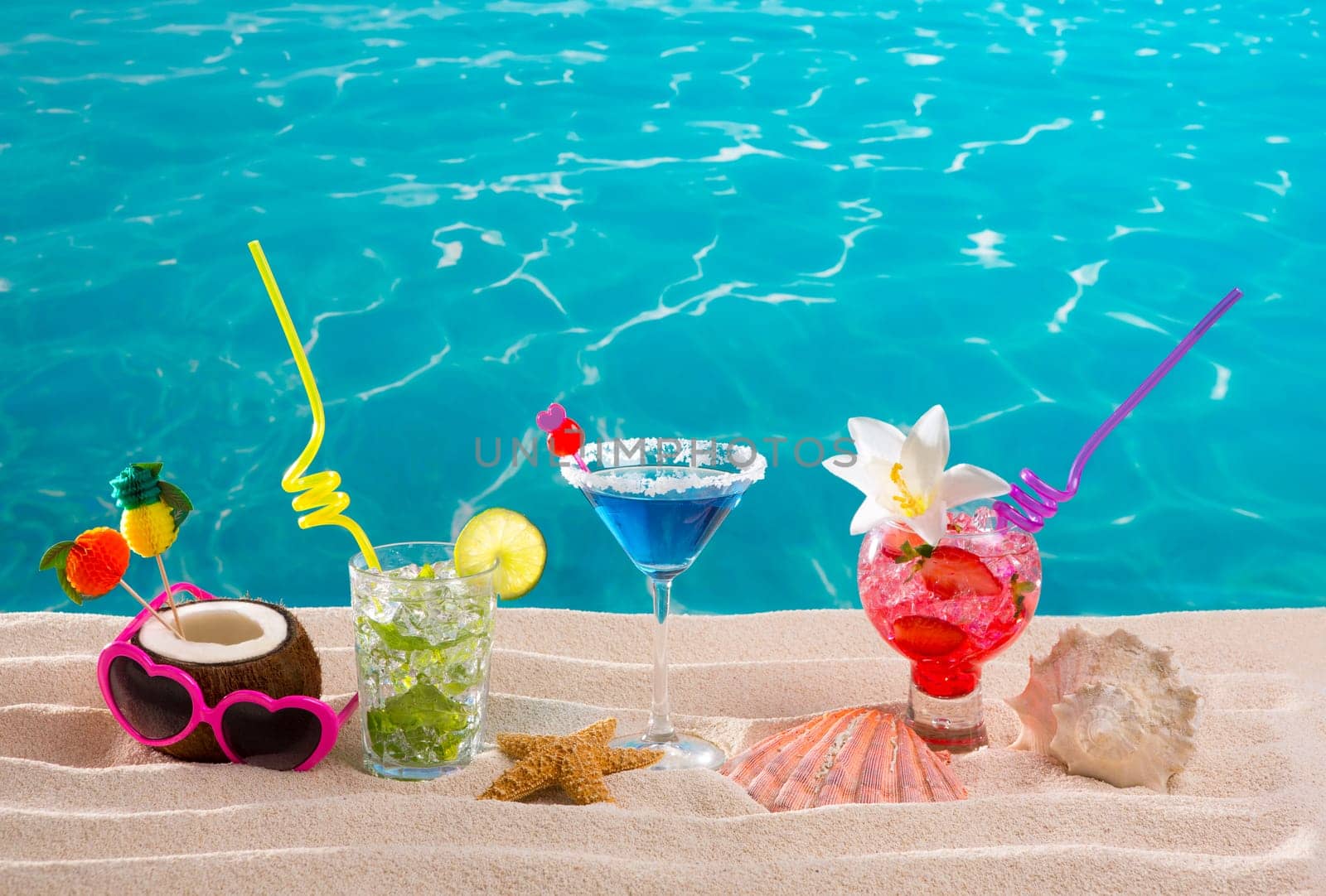 beach tropical cocktails on white sand mojito blue hawaii on white sand