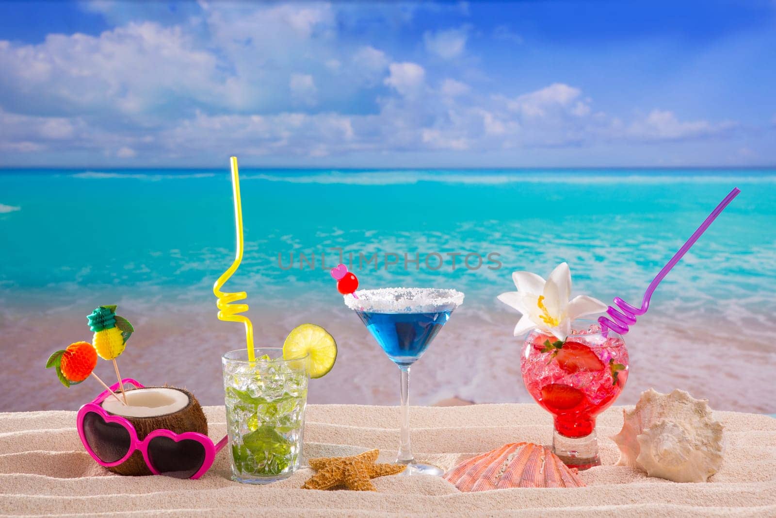 beach tropical cocktails on white sand mojito blue hawaii on white sand