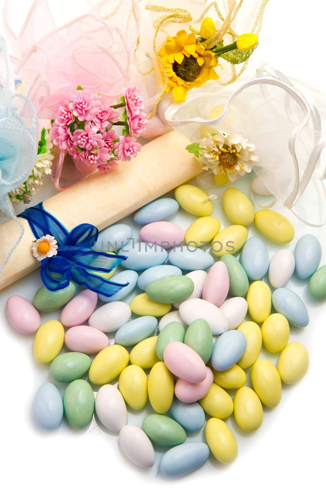 different colored candy favor on white background