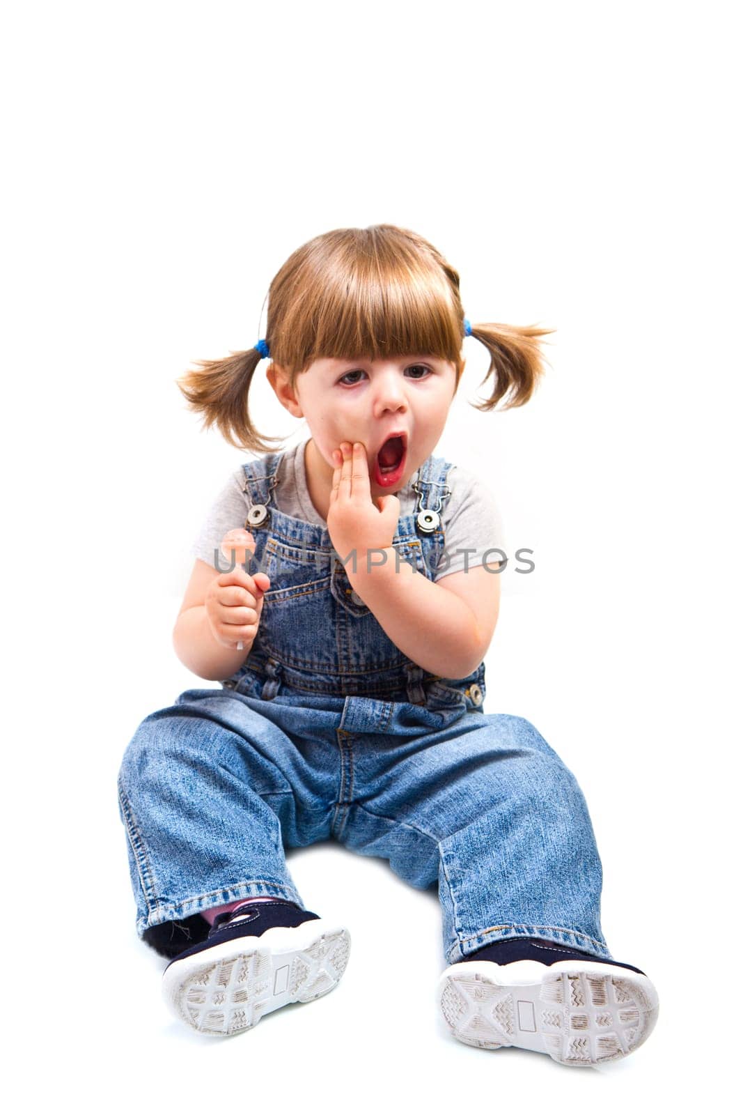 baby girl with  a Toothache isolated on white
