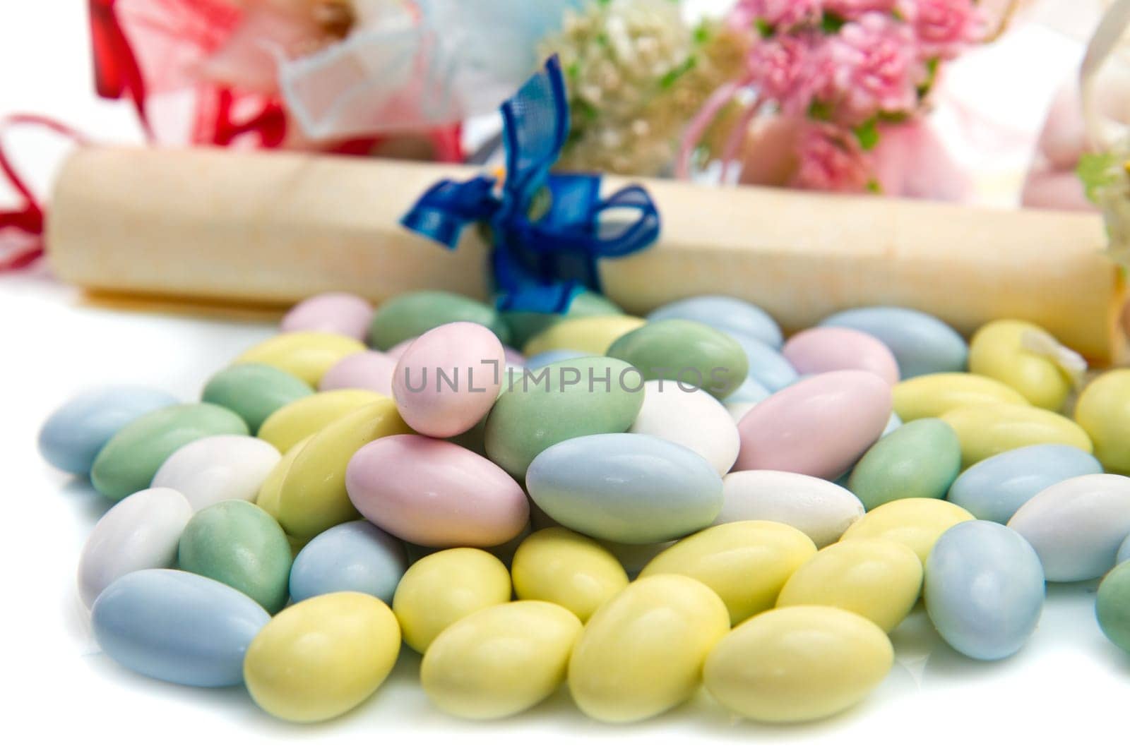 different colored candy favor on white background