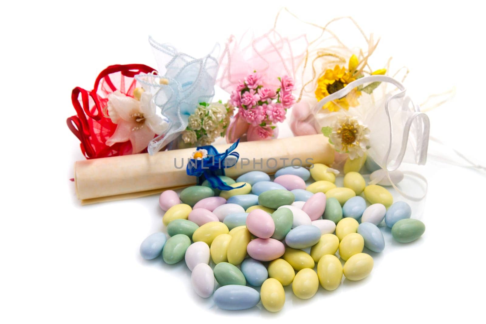 different colored candy favor on white background