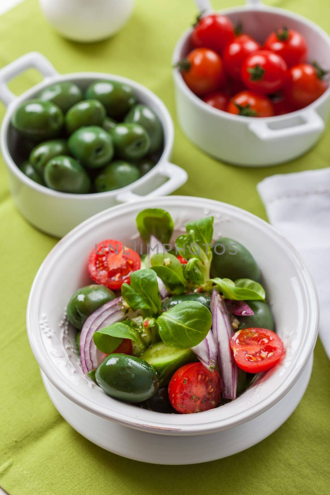 Greek salad with fresh green olives