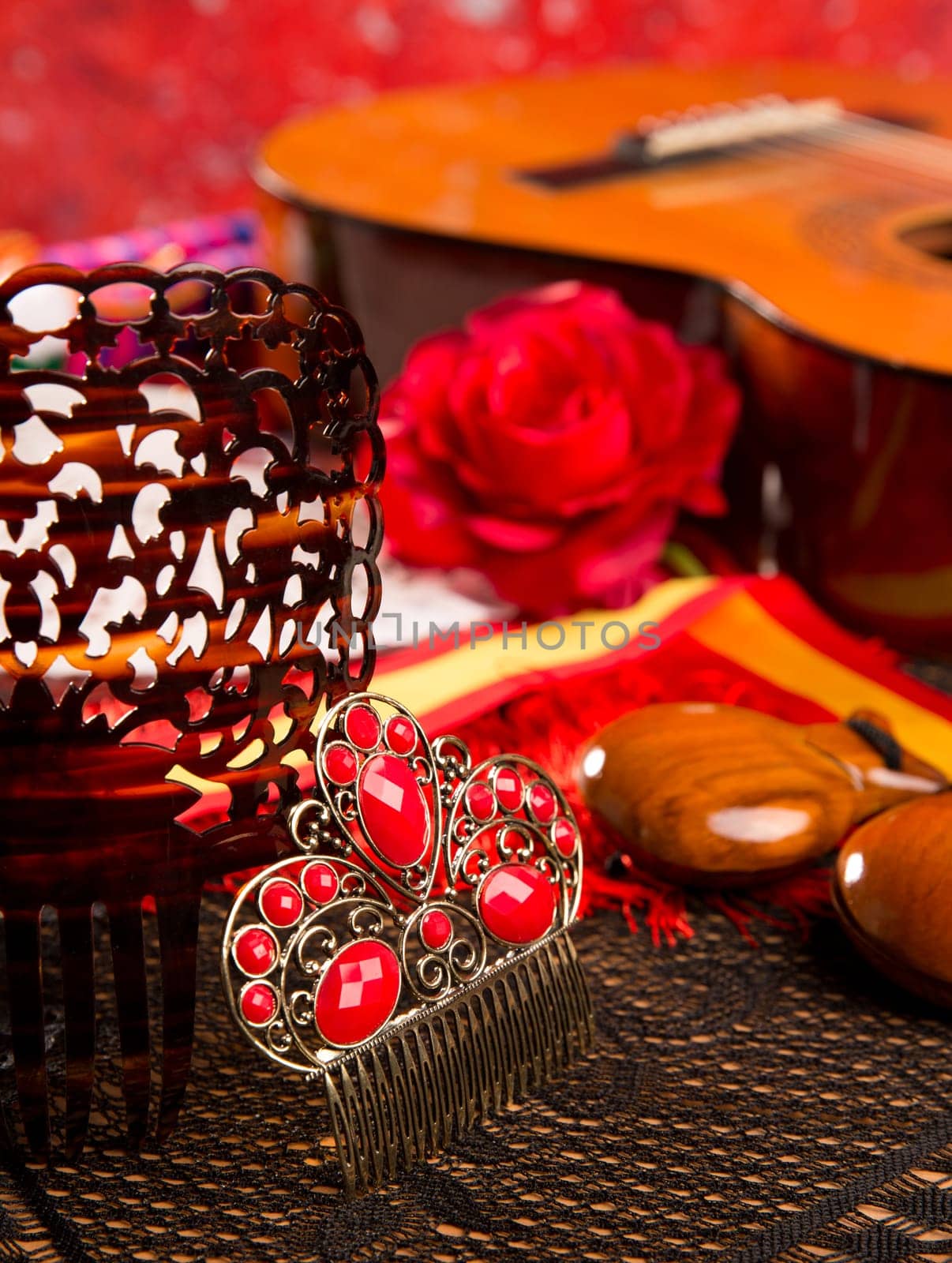 Classic spanish guitar with flamenco elements as comb and castanets